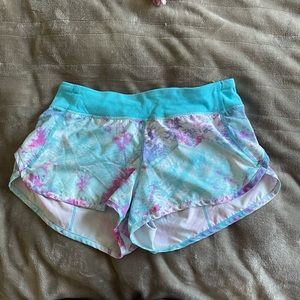 Ivivva blue and pink tie dye athletic shorts. Size 14.
